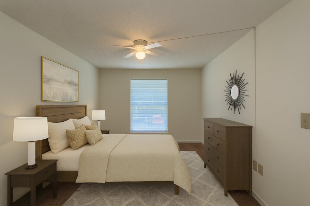 Modern bedroom at Creekwood Apartments in Gainesville,Florida