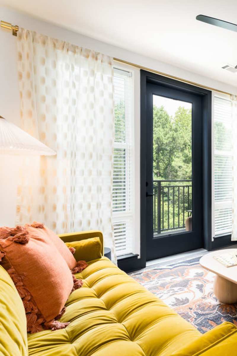 Living room with patio at Channel House in Raleigh, North Carolina