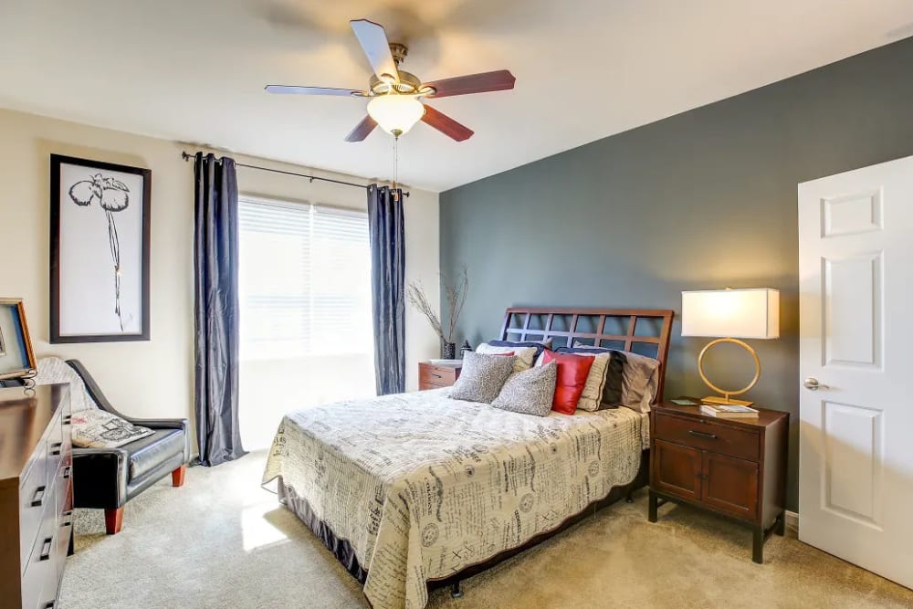 A furnished bedroom in Charleston Pines Apartment Homes in Florence, Kentucky