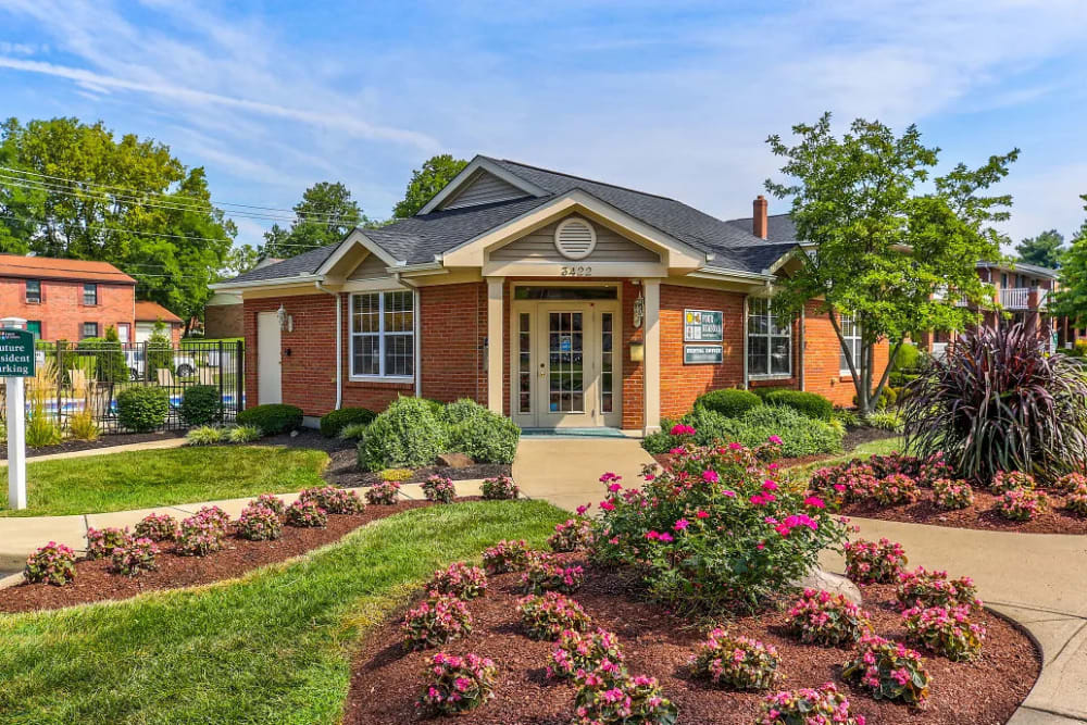 Beautifully landscaped entrance to the leasing office of Four Seasons Apartments in Erlanger, Kentucky