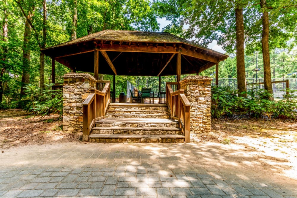 Gazebo with tables and chairs at Marquis at Sugarloaf in Duluth, Georgia