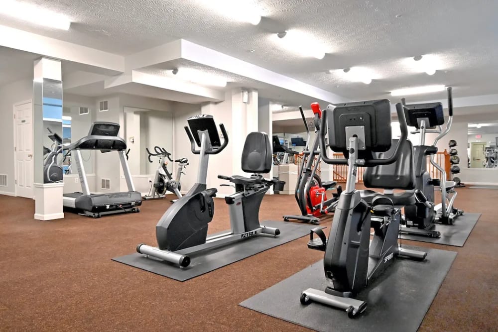 Full-equipped fitness center at Woodspring Apartments in Florence, Kentucky