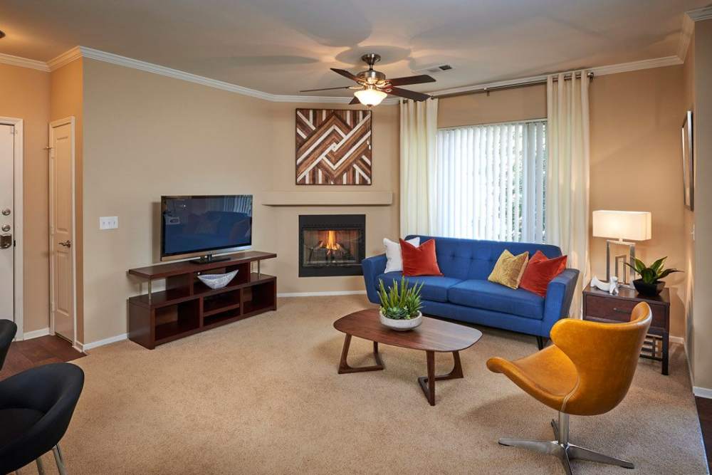 Living room at Legend Oaks Apartments in Aurora, Colorado