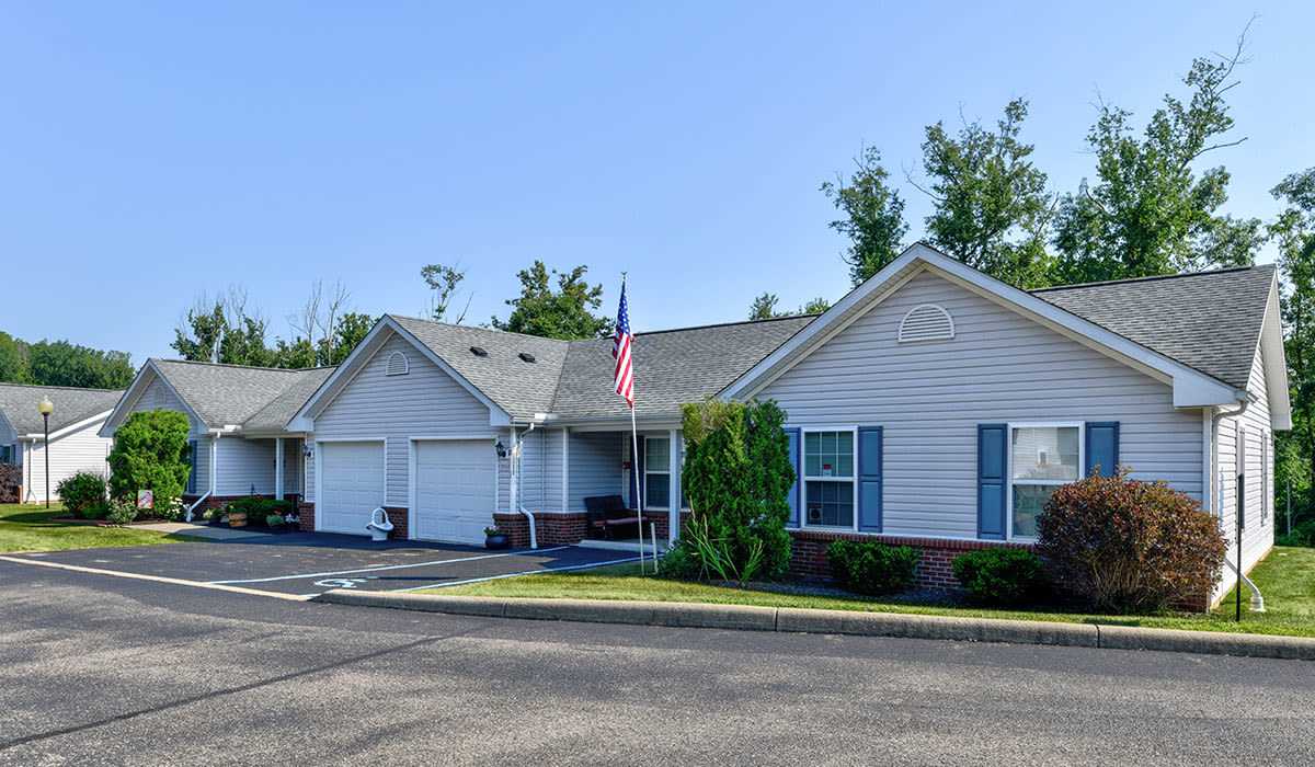 Single-story buildings with a flagpole at Clover Ridge in McConnelsville, Ohio