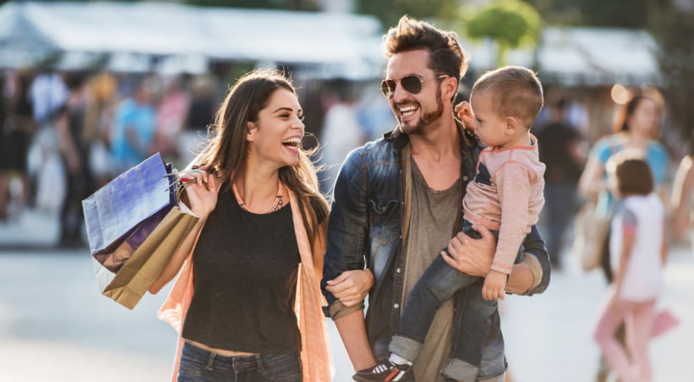 A happy family shopping near CityView in North Kansas City, Missouri
