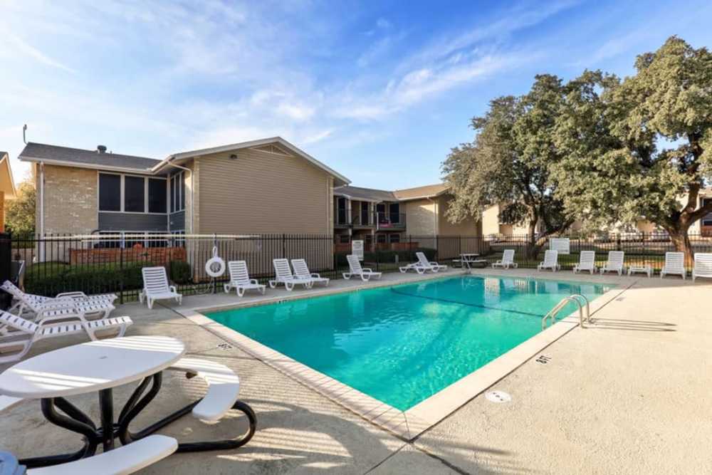 Resort-style swimming pool at Tribecca Pointe Apartments in Hurst, Texas