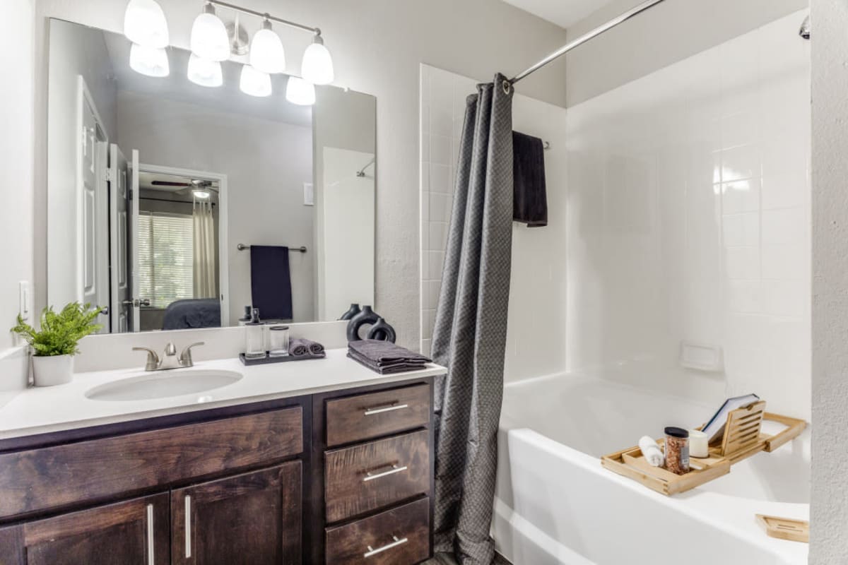Modern finishes in an apartment bathroom at Sycamore Springs in Austin, Texas