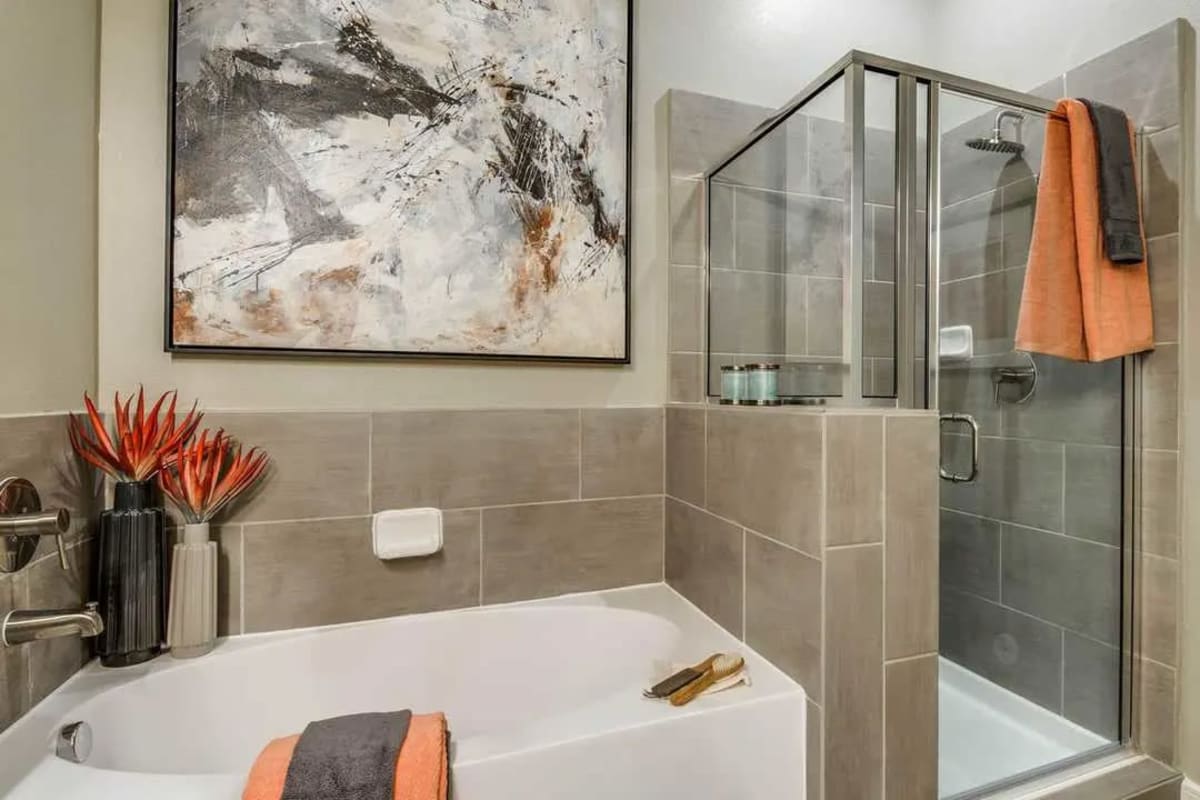 Soaking tub and walk in shower at Capitol at Stonebriar in Frisco, Texas