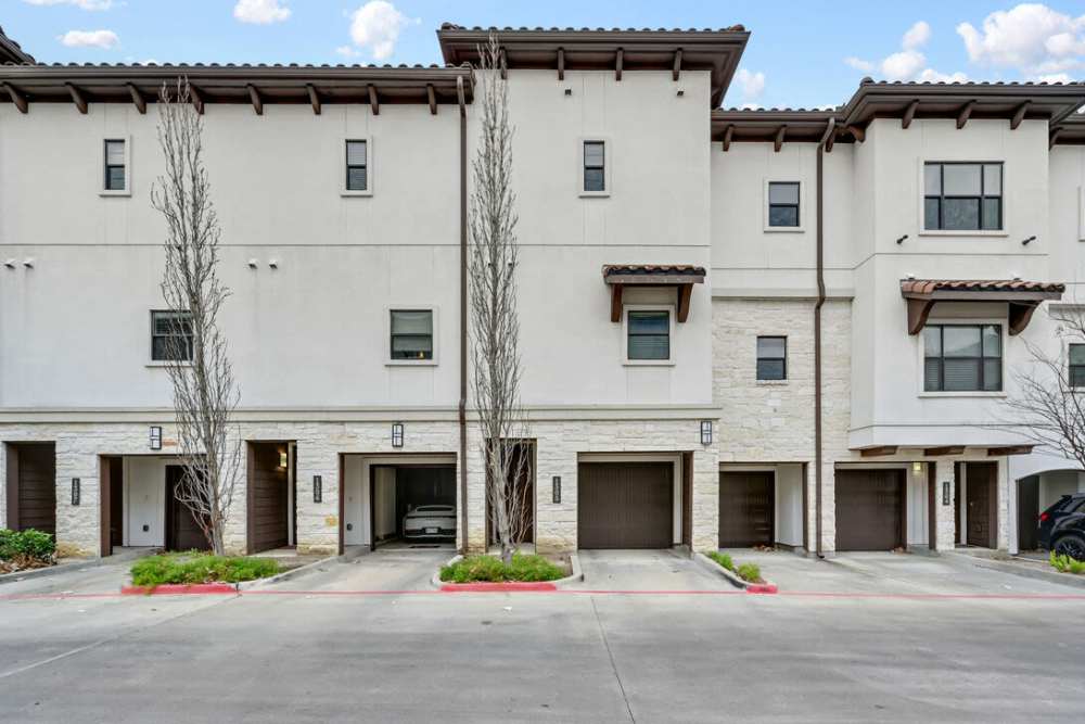 Exterior view of community apartment with garage at Domain Memorial in Houston, Texas