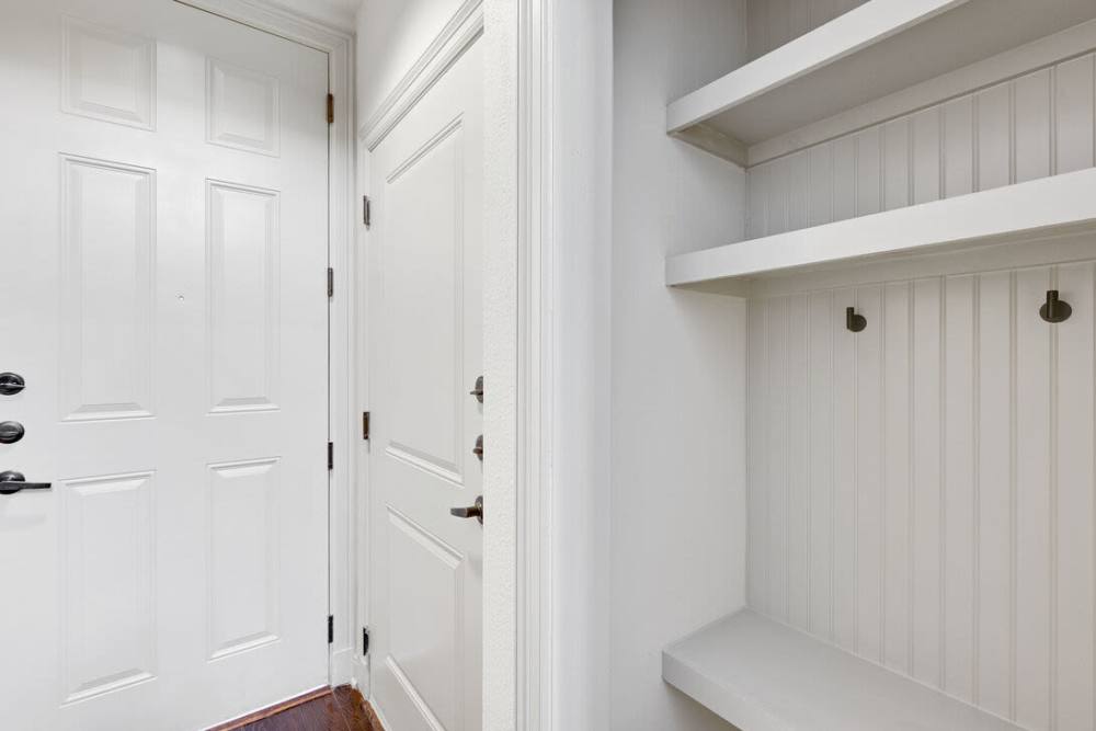 Coat closet with shoe rack in a apartment at Domain Memorial in Houston, Texas