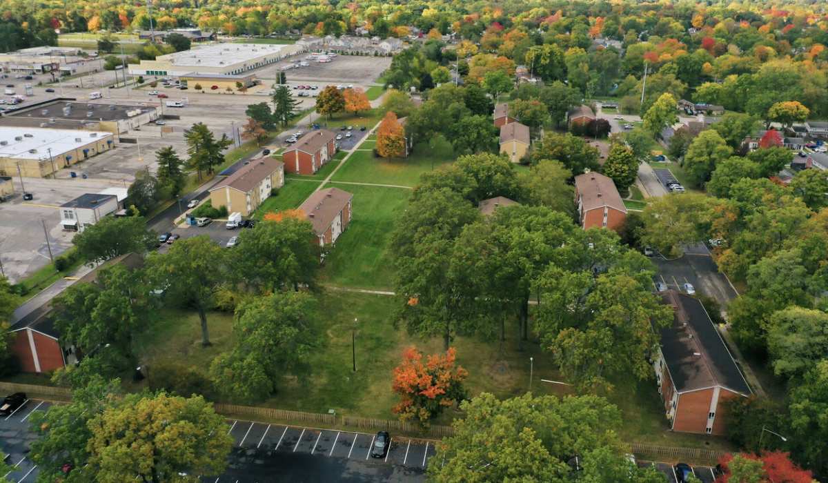 Charming community surrounded by lush landscaping in The Reserve at Pin Oak Manor Apartments in Mishawaka, Indiana.