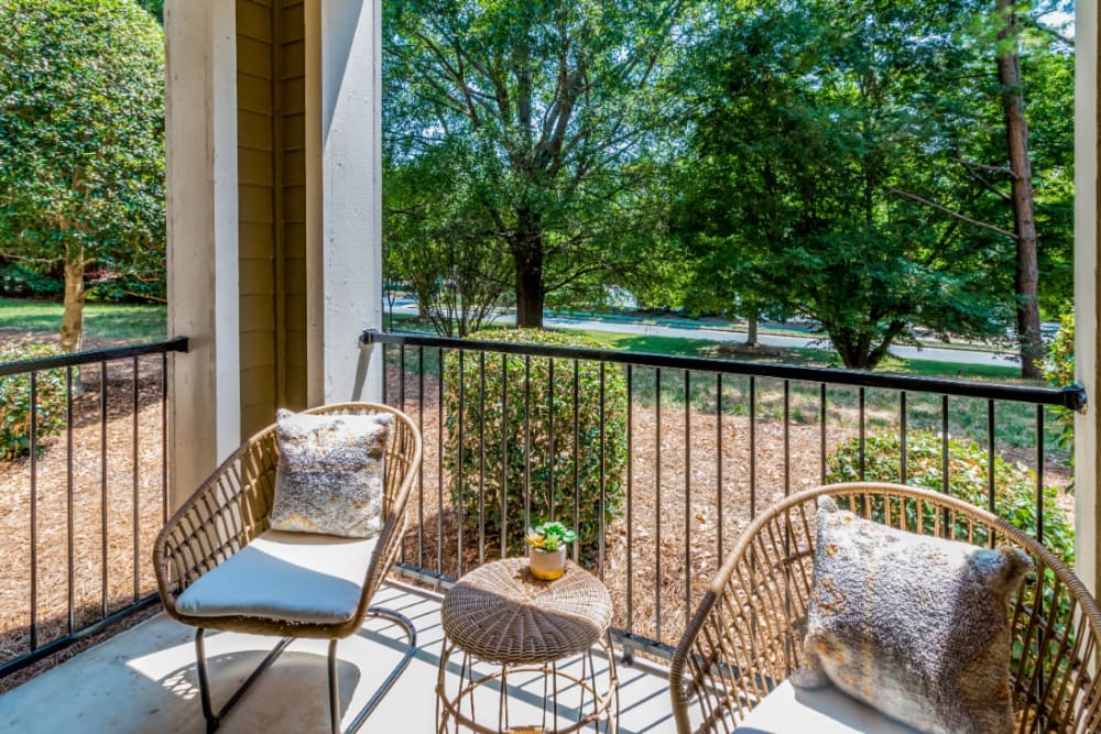 Private balcony with seating area at Marquis at Carmel Commons in Charlotte, North Carolina