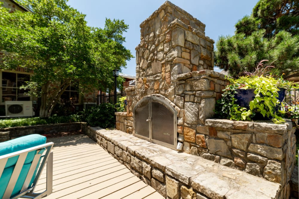 Outdoor stone fireplace at Marquis at Bellaire Ranch in Fort Worth, Texas