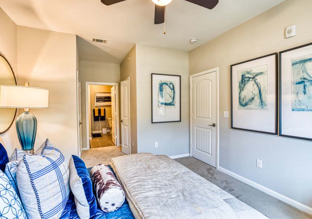 Spacious bedroom with natural lighting at Hollybrook Ranch in Round Rock, Texas