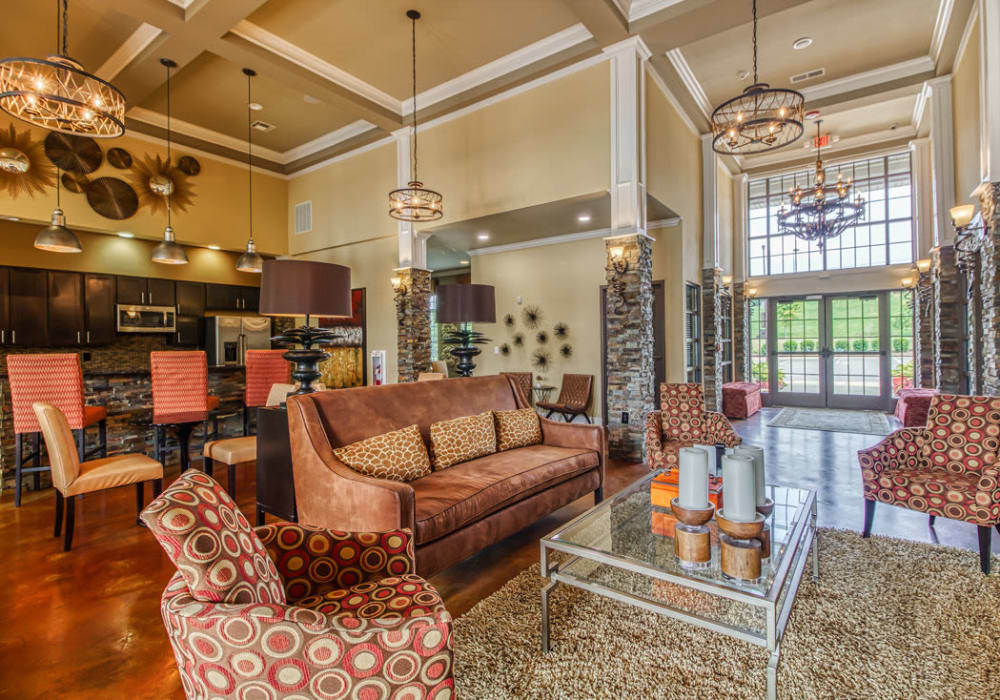 Residence lounge with TV, game room, and fully equipped kitchen at Glass Creek in Mt Juliet, Tennessee
