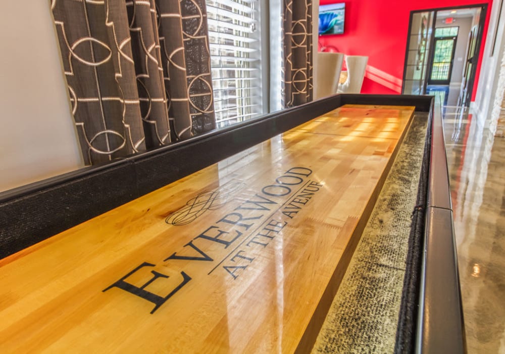 Shuffleboard in residents game area at Everwood at The Avenue in Murfreesboro, Tennessee