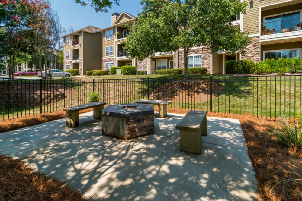Firepit with stone benches at Marquis at Carmel Commons in Charlotte, North Carolina