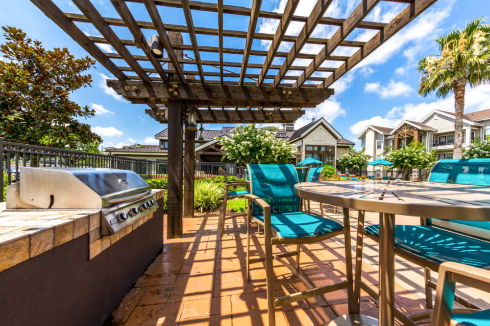 BBQ and dining area under gazebo at Marquis at Sugar Land in Sugar Land, Texas