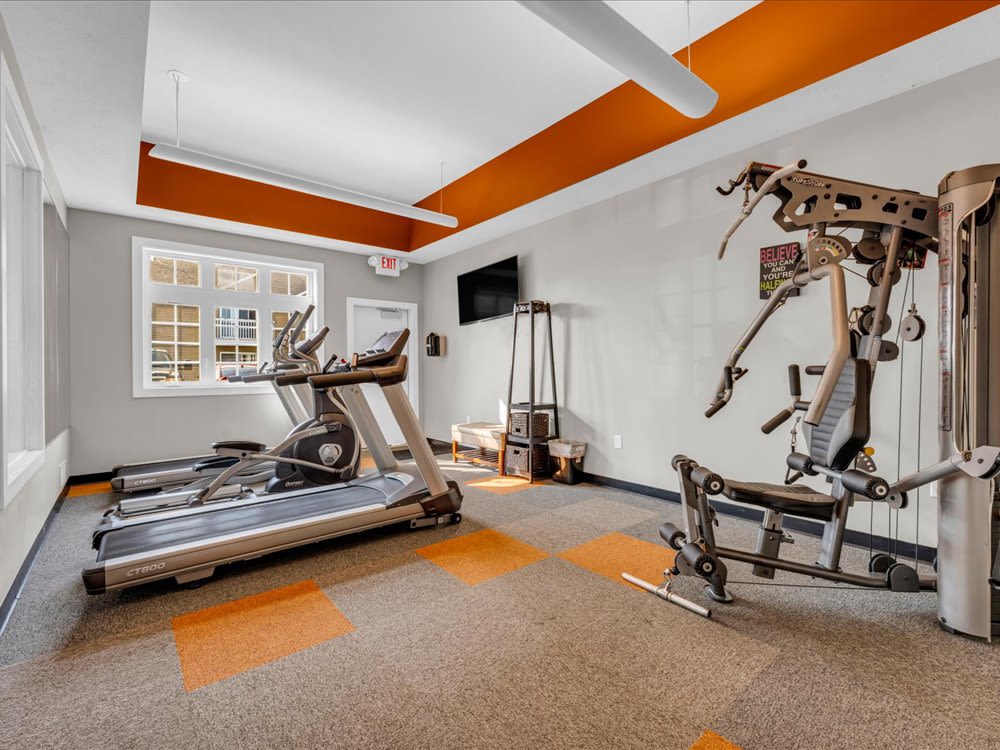 Fitness center with cardio and strength equipment at River Club in Holland, Michigan