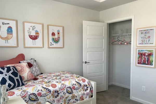 Guest bedroom with plenty of storage space at The Village at Mill Creek in Statesboro, Georgia