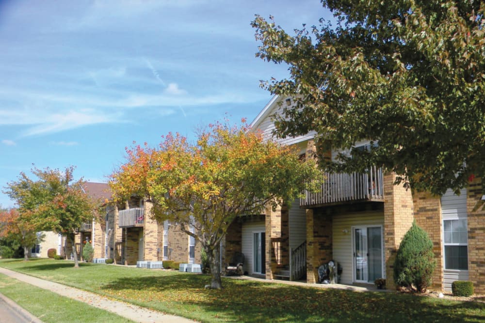 Outdoor area with trees at Campbell Flats Apartments in Springfield, Missouri