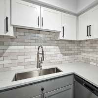 Kitchen with white cabinetries at Clifton on 7th in Phoenix. AZ