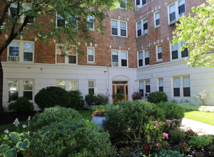 An apartments with lush greenery at Pondview Apartments in Jamaica Plain,Massachusetts