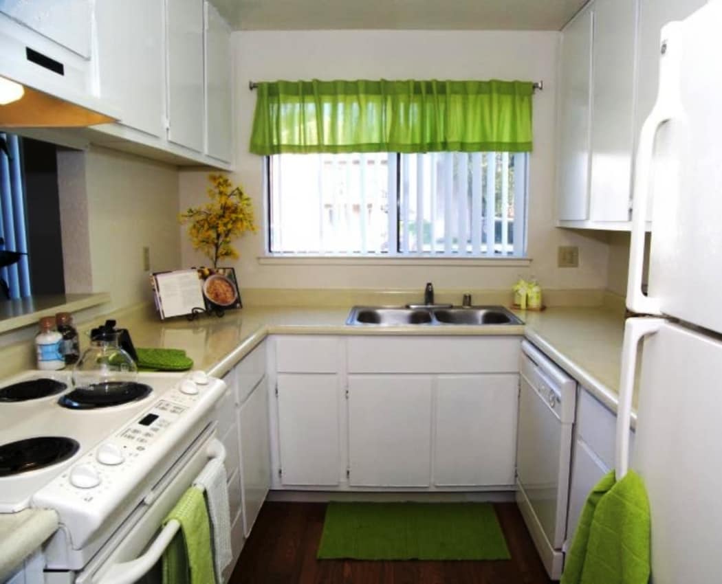 Spacious and bright kitchen in model home at Waterfield Square Apartment Homes in Stockton, CA