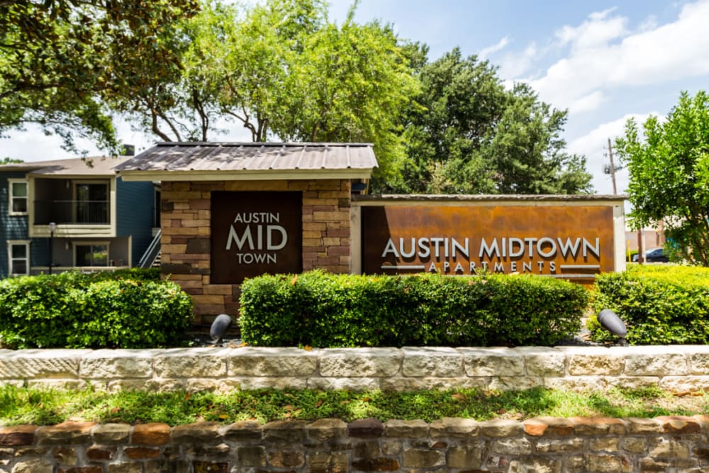 Main entrance property sign at Austin Midtown in Austin, Texas