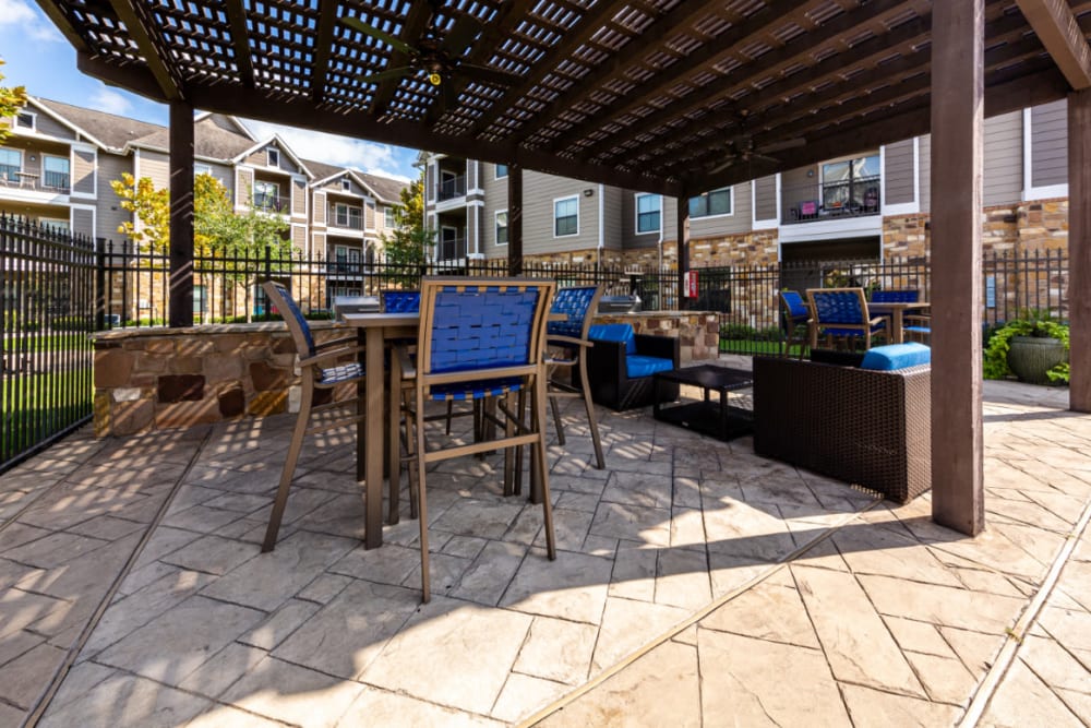 Outdoor covered BBQ and dining area at Marquis at Katy in Katy, Texas