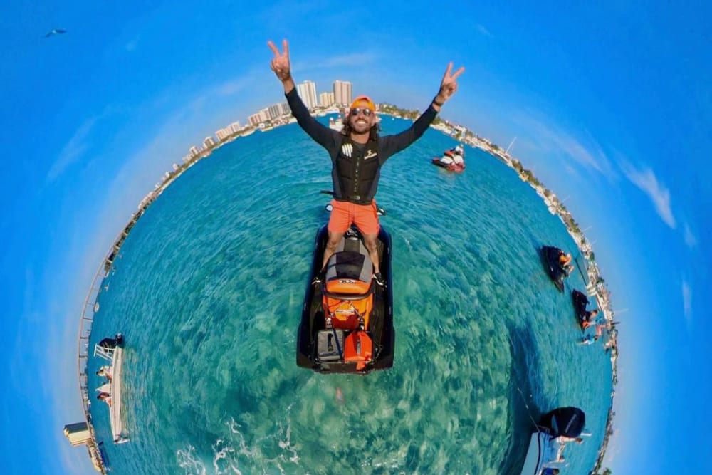 circular image of jet ski on  the water