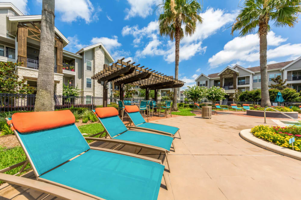 Colorful and bright lounge chairs at Marquis at Sugar Land in Sugar Land, Texas