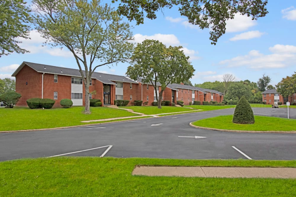 View of Property with trees in front at Laurel Run Village in Bordentown, New Jersey