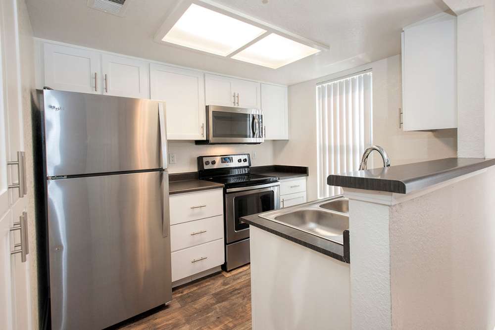 Stainless-steel appliances in kitchen at Sandpiper Village Apartment Homes in Vacaville, California
