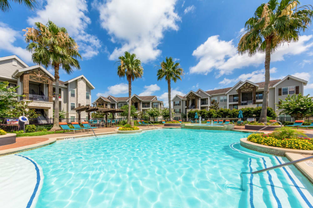 Resort style swimming pool at Marquis at Sugar Land in Sugar Land, Texas
