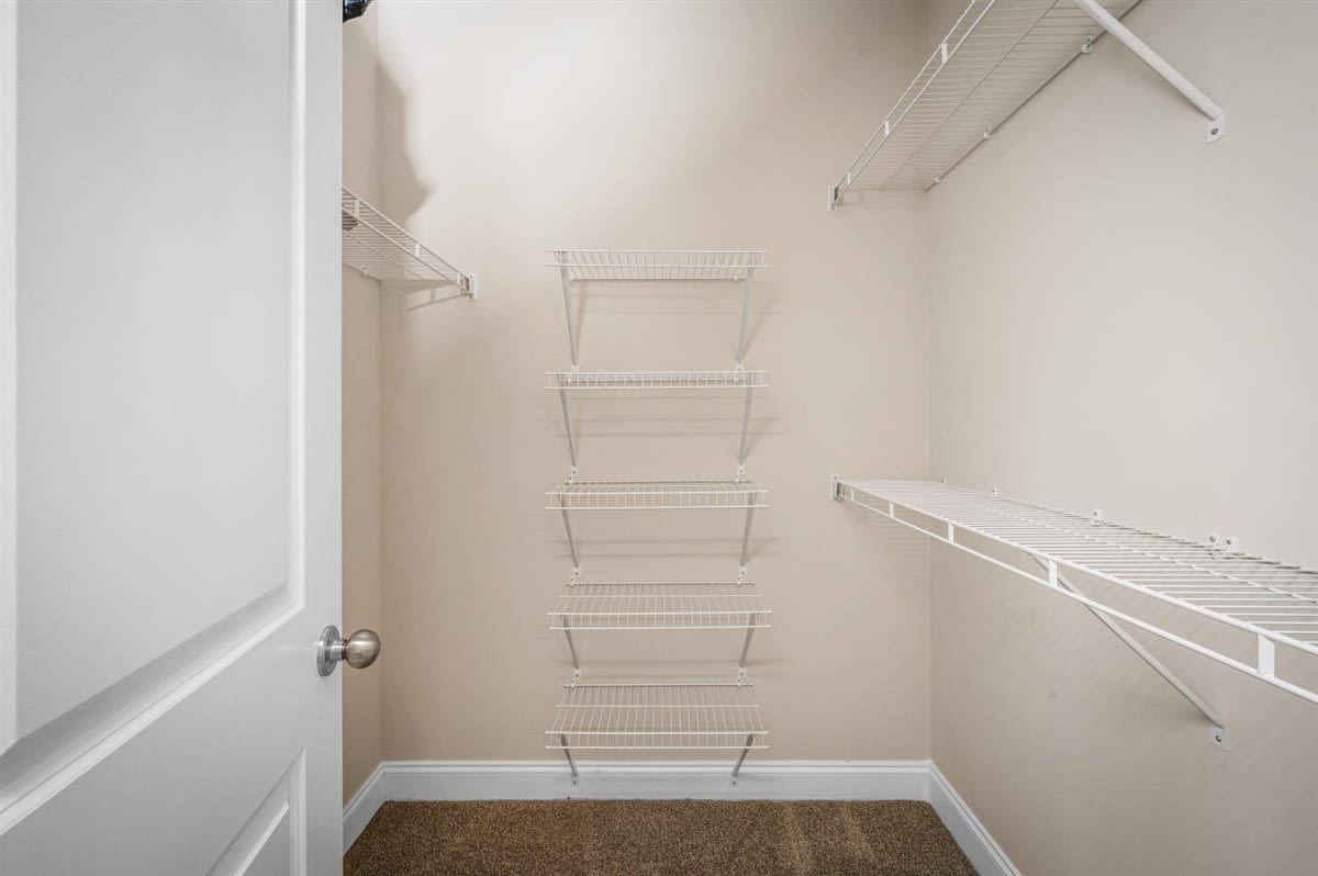 A walk-in closet with plenty of shelf space at Bowman Station in Macon, Georgia