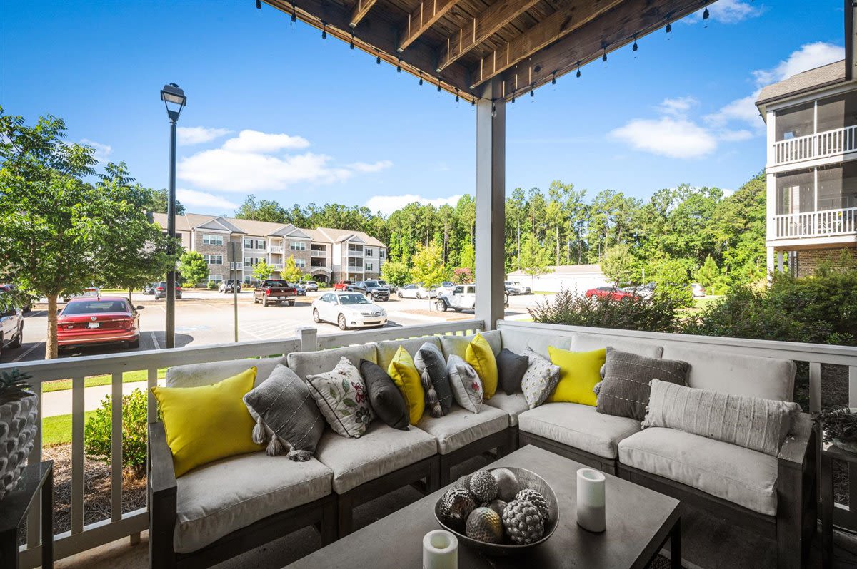 A sectional couch on an apartment patio at Bowman Station in Macon, Georgia