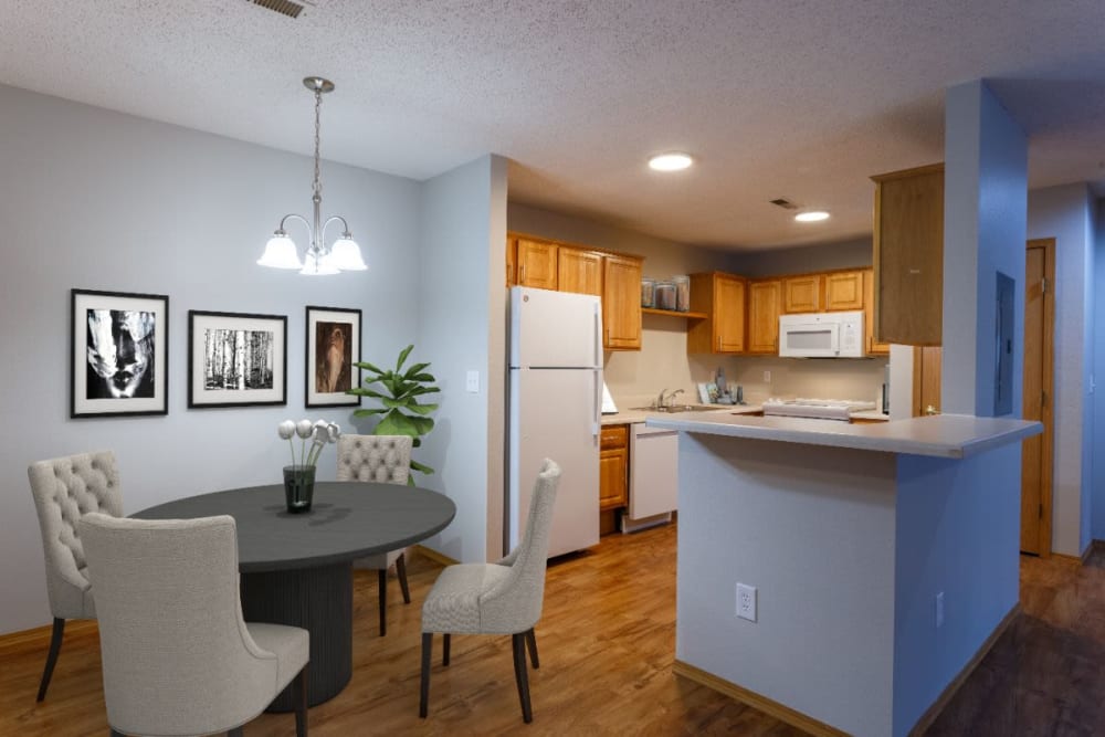 Large living space with hardwood floors at Campbell Flats Apartments in Springfield, Missouri