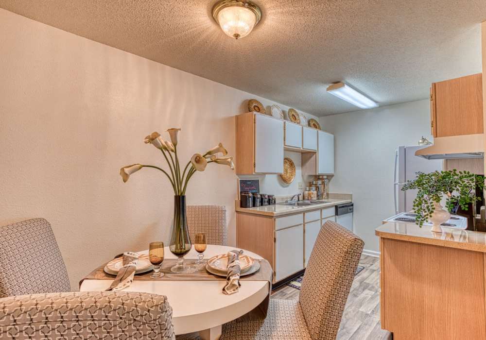 Dining room with round table at Treybrooke Village in Greensboro, North Carolina