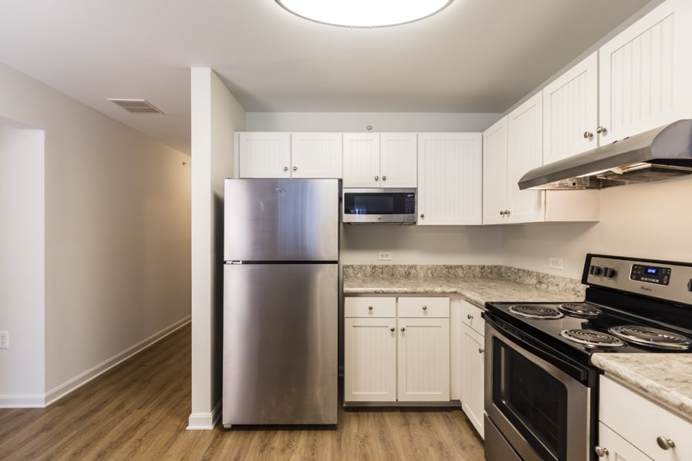 Kitchen with stainless-steel appliances at The Greens at Sunchase in Farmville, Virginia