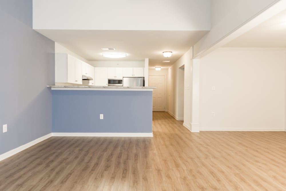 Spacious apartment with plank flooring at The Greens at Sunchase in Farmville, Virginia