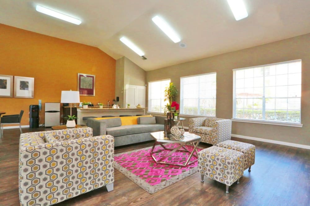 Common area with comfortable seating at Compass at Windmill Lakes in Houston, Texas