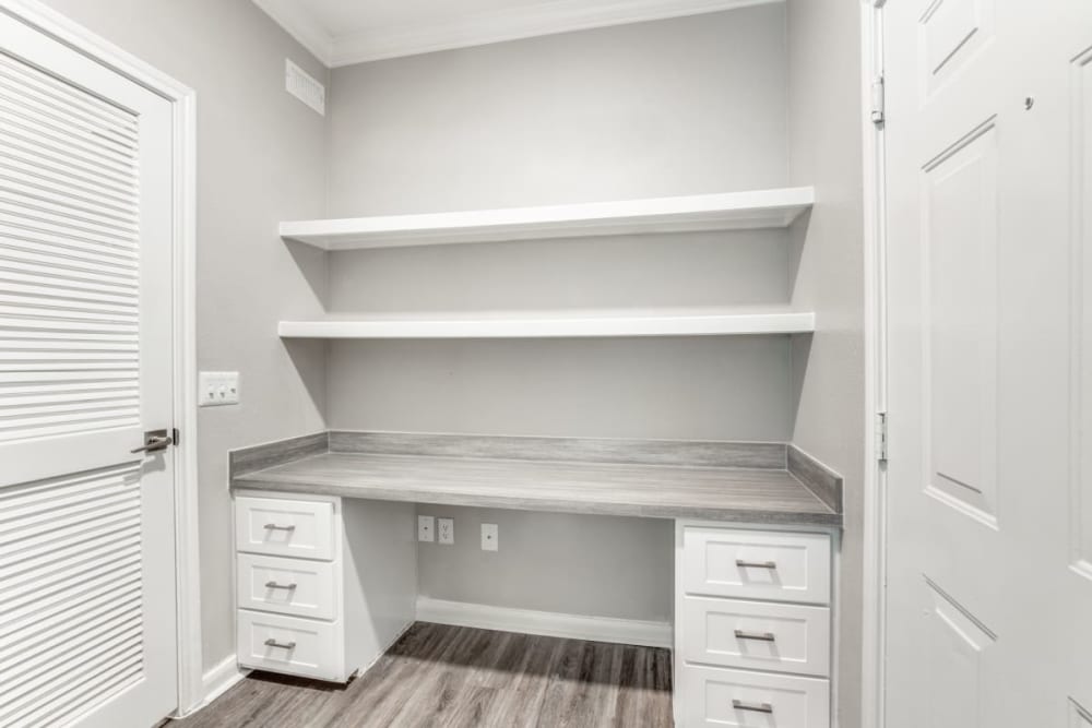 A built in office desk and shelves at Compass at Windmill Lakes in Houston, Texas