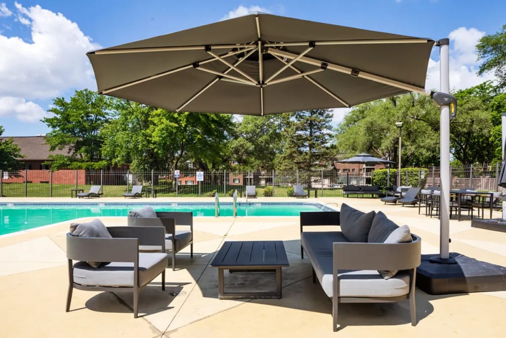 Swimming pool with lounge chairs at Terraces of Elk Grove in Elk Grove Village, Illinois