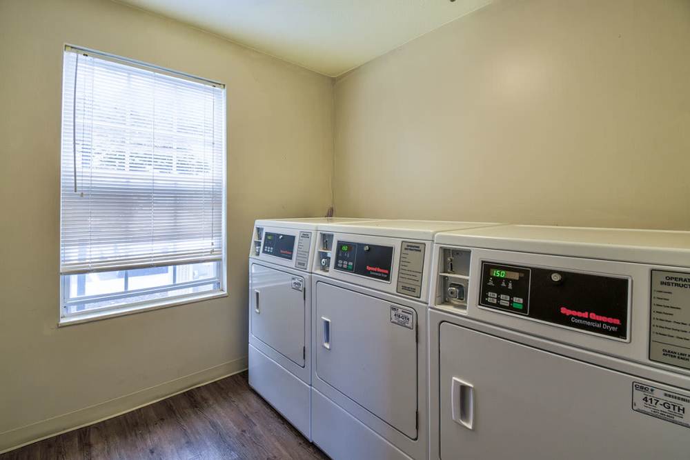 Laundry with wood flooring at Bayberry Place in Keyser. WV