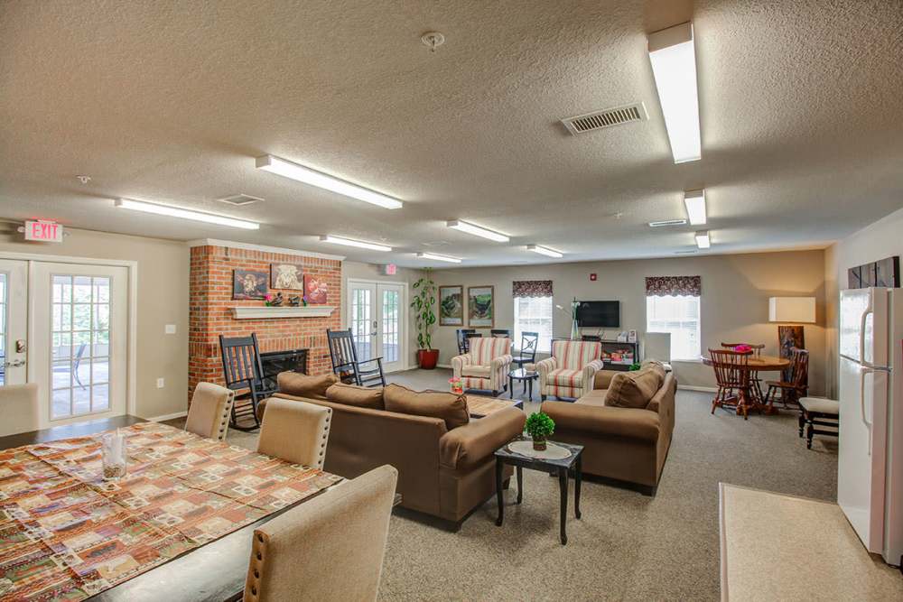 Community room with couch and chairs at Barton Greene in Greeneville. TN