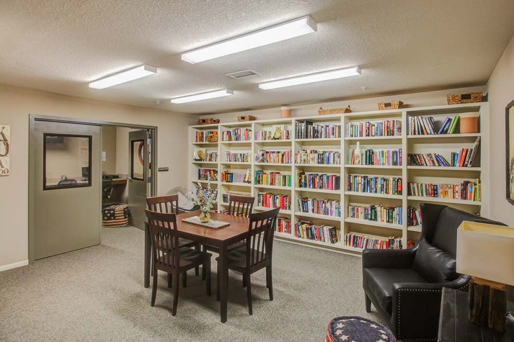 Library with chairs and tables at Barton Greene in Greeneville. TN