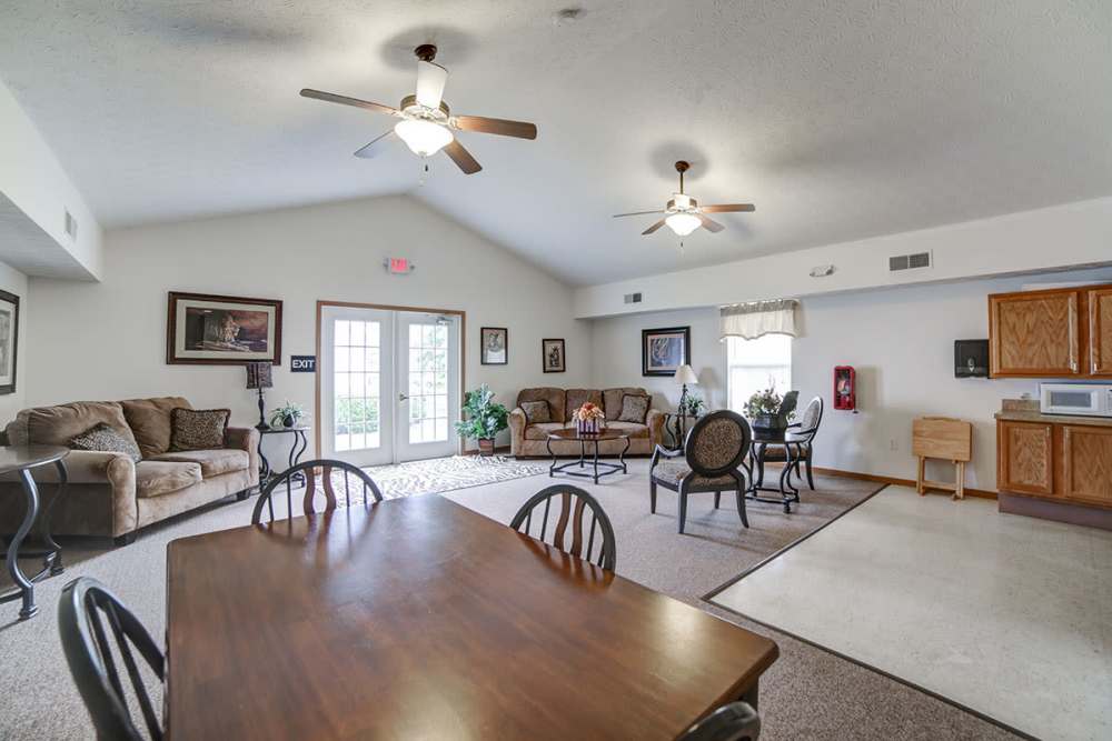 Spacious community room with kitchen at Ridgewood Greene in Reynoldsville, Pennsylvania