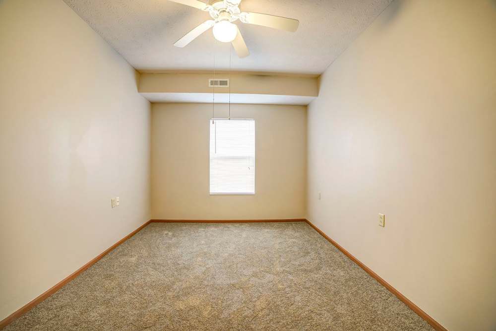 Well-lit apartment bedroom at Brentwood Greene in Kokomo, Indiana