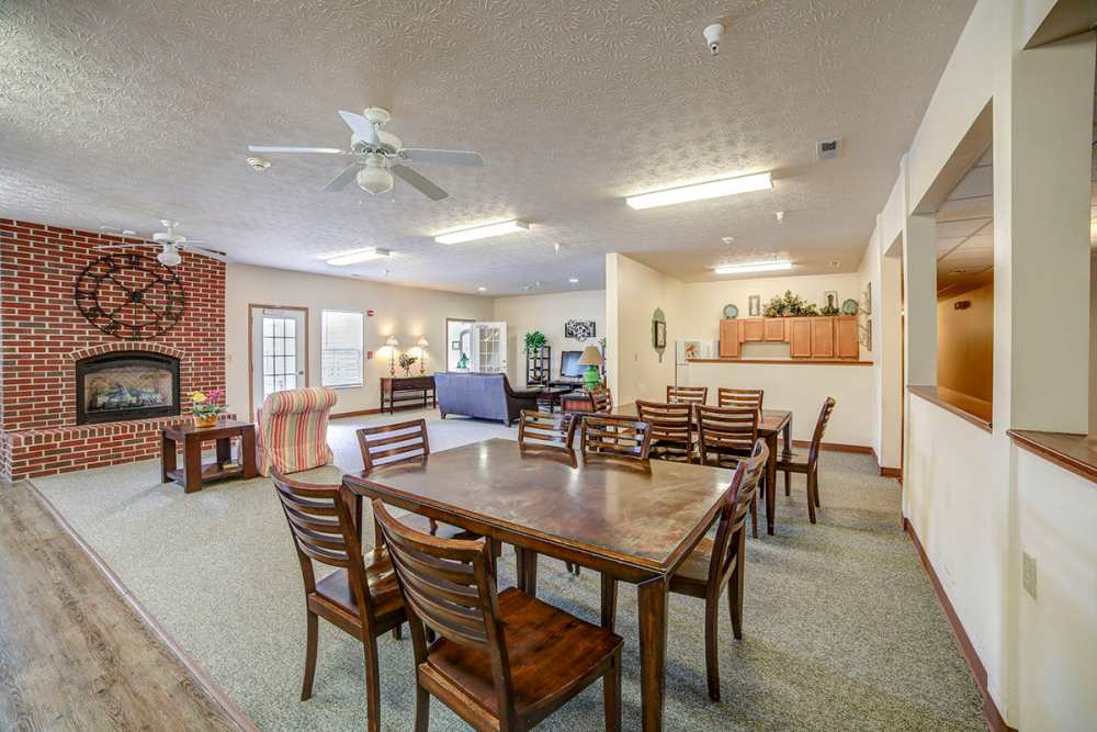 Community room with kitchen and dining space at Brentwood Greene in Kokomo, Indiana